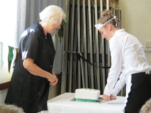 Cutting the cake.