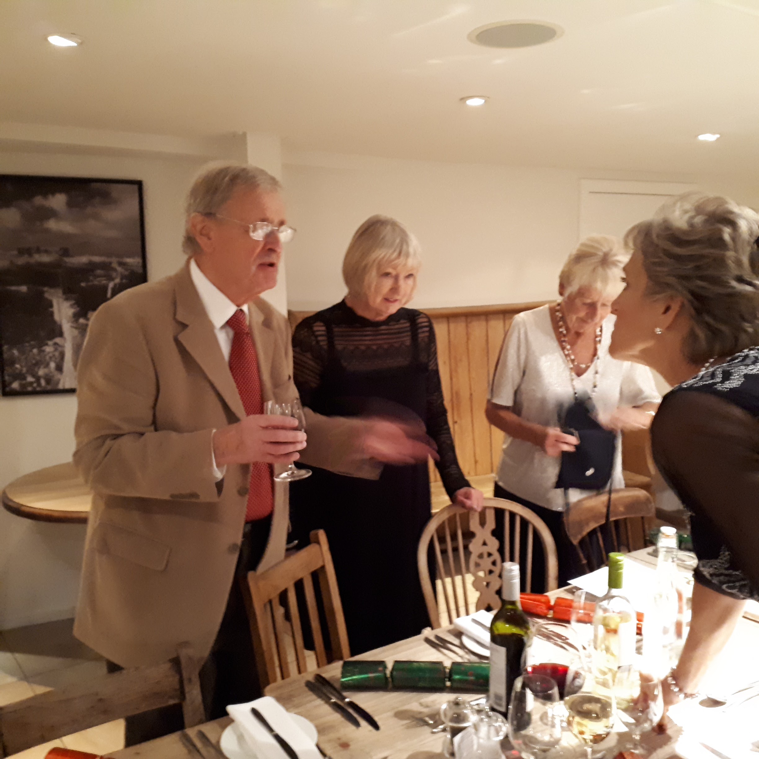 Guests standing at table